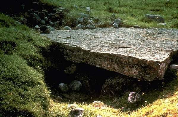 Click to see the tomb after excavation.